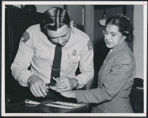 Rosa_Parks_being_fingerprinted_by_Deputy_Sheriff_D.H._Lackey_after_being_arrested_for_boycotting_public_transportation_-_Original